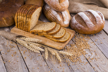 fresh bread and wheat on the wooden