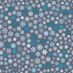 Seamless pattern of snowflakes, white and blue on gray