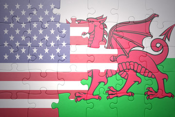 puzzle with the national flag of united states of america and wales