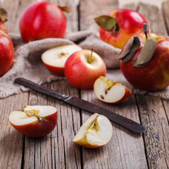 Fresh red apples on wooden background.selective focus.