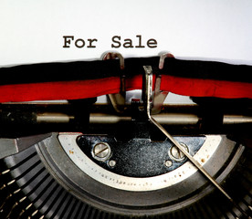 sale written with black ink with the old typewriter