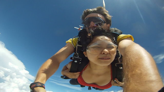 Skydiving tandem asian female