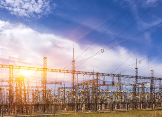  electric substation with power lines, at sunset