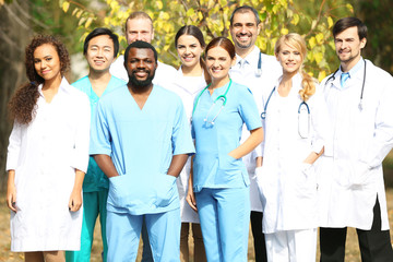 Smiling medics team, outdoors