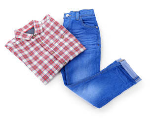 Blue jeans with red plaid shirt isolated on white background