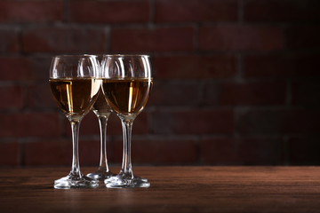 Half full wine glasses on a table