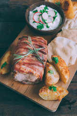 Served rolled meat and potatoes