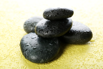 Spa stones on a light background