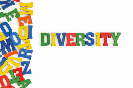 Series "Conceptual words": word "Diversity" in wooden letters on white background
