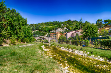 three archs medieval bridge in Italy
