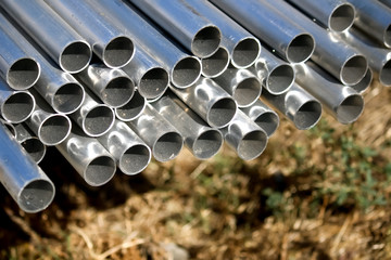 Stack of Many Pipes at the Construction Site