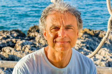  three-day beard adult on the sea shore