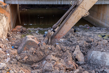 Excavator construction equipment park at worksite