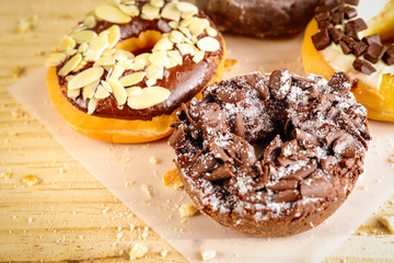 Donuts on wooden background
