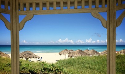 caribbean beach framed with gazebo