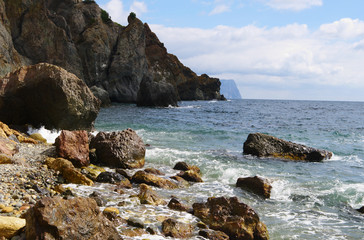 Jasper beach of Black sea with colorful stones and pebbles, cape Fiolent, Crimea, Russia 