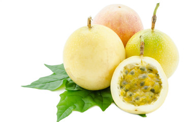 Yellow Passion fruit and green leaf.
