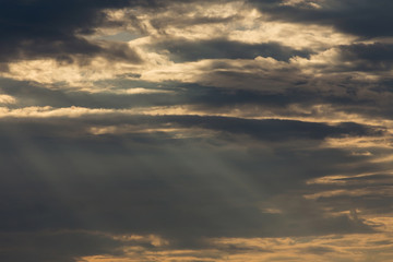 ray light of sun through cloud