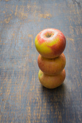 Red apples isolated on a wood
