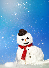 Snowman With A Red Scarf And Black Hat Concept