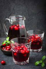 refreshing cranberry drink and fresh berries