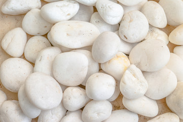 Fototapeta na wymiar White pebble stones background