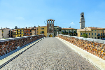 Fototapeta na wymiar Ponte di Pietra. Bridge in Verona in a summer day