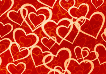 many multicolored hearts on red background