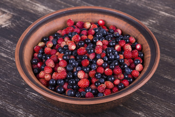 Fresh fruit salad with strawberries and blueberries , wild berry