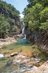 Naklejka na ściany i meble Klong Phlu Waterfall on Koh Chang or Chang island, Thailand