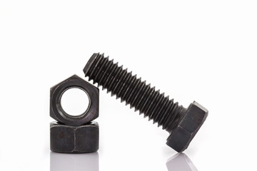 Closeup metal screw, bolt and nuts.