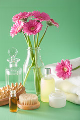 spa aromatherapy with gerbera flowers essential oil brush