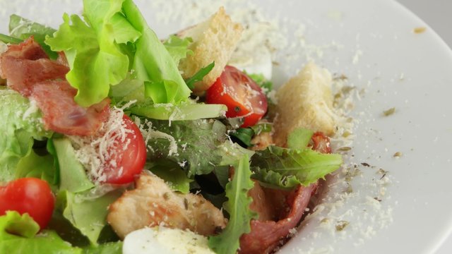 Caesar salad with chicken and quail eggs