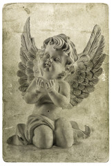 Little guardian angel. Old paper texture. Christmas card