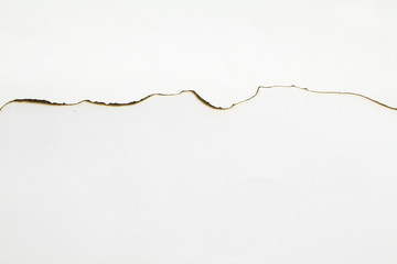 Burned paper edges set isolated on white