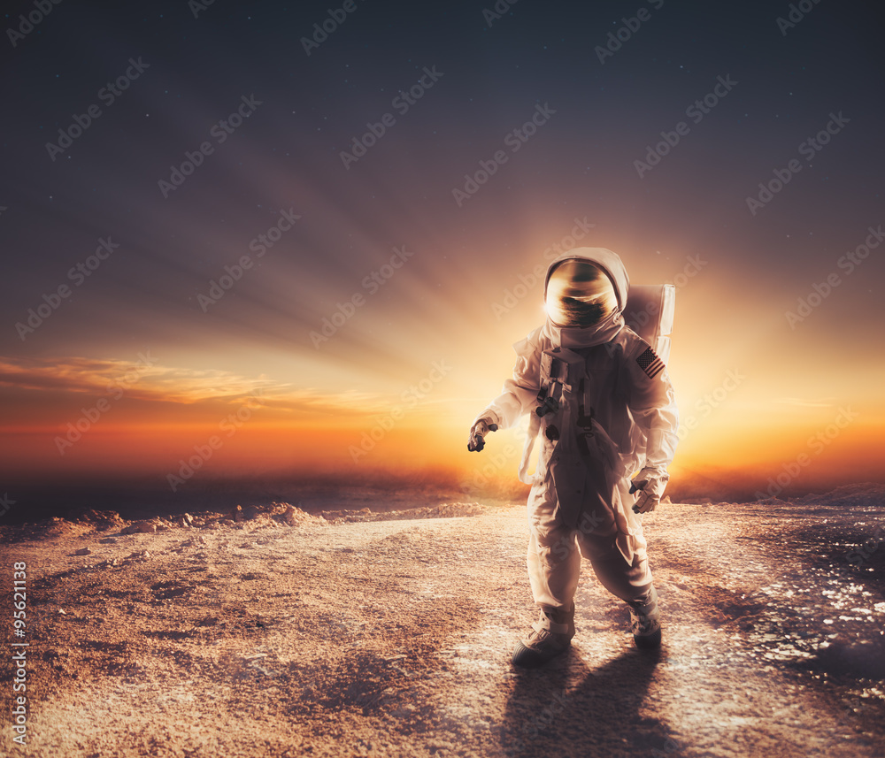 Canvas Prints astronaut walking on an unexplored planet