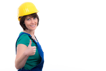 handwerker mit bauhelm zeigt motiviert daumen hoch