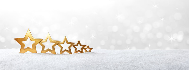 Five golden stars snow banner
