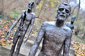Fototapeta na wymiar Prague Comunism monument of depicting crumbling men going down the stairs