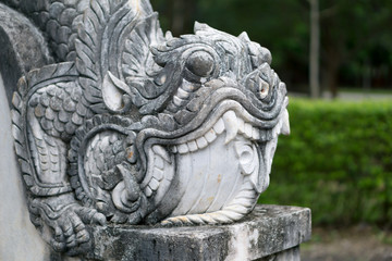 An old sculpture in the park of Thal university