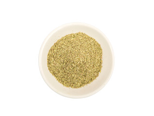 Dried oregano herbs over in white bowl over white background