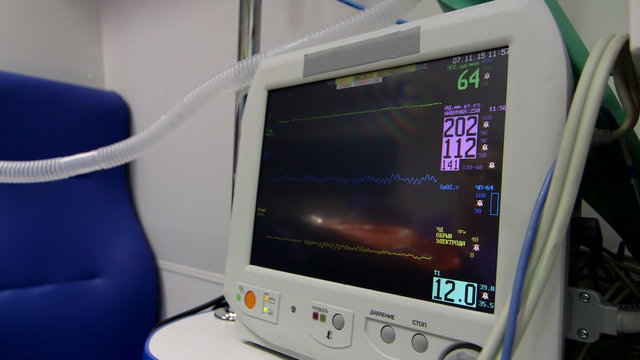 Screen of multiparameter ambulance patient monitor indicates critical high blood pressure