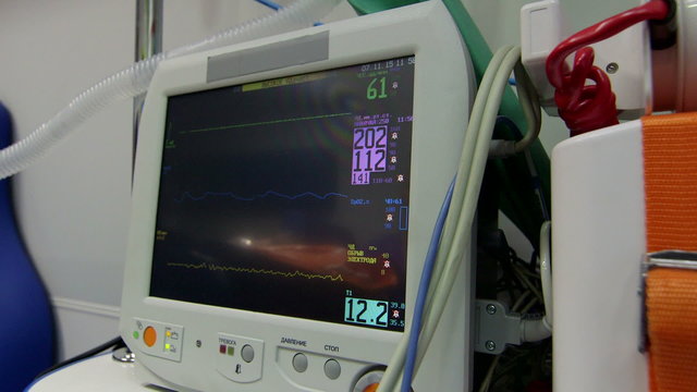 Paramedic provide emergency medical care and transportation for senior patient with high blood pressure