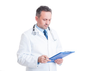 Smart doctor or medic analyzing document on clipboard