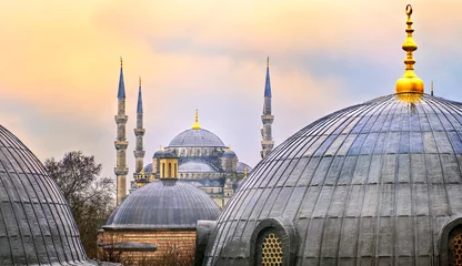 Fototapeten Domes of Blue Mosque in Istanbul on sunset, Turkey © Boris Stroujko