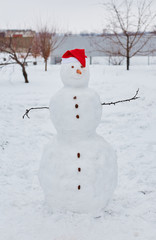 Real snowman outdoors 