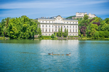 Fototapeta na wymiar Famous Schloss Leopoldskron with Hohensalzburg Fortress in Salzburg, Austria