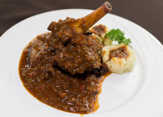 Grilled lamb steak with spicy chili sauce.