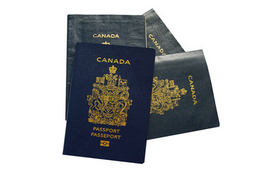 Close up of valid Canadian passports, the older and the new ePassport with an electronic chip