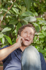 Man using a cellphone in the park